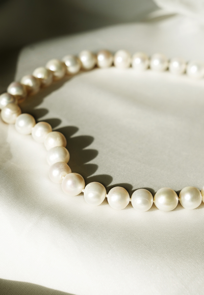 "Collier perles opulentes"